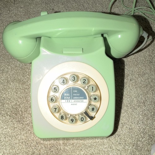 Green retro corded telephone - retro,